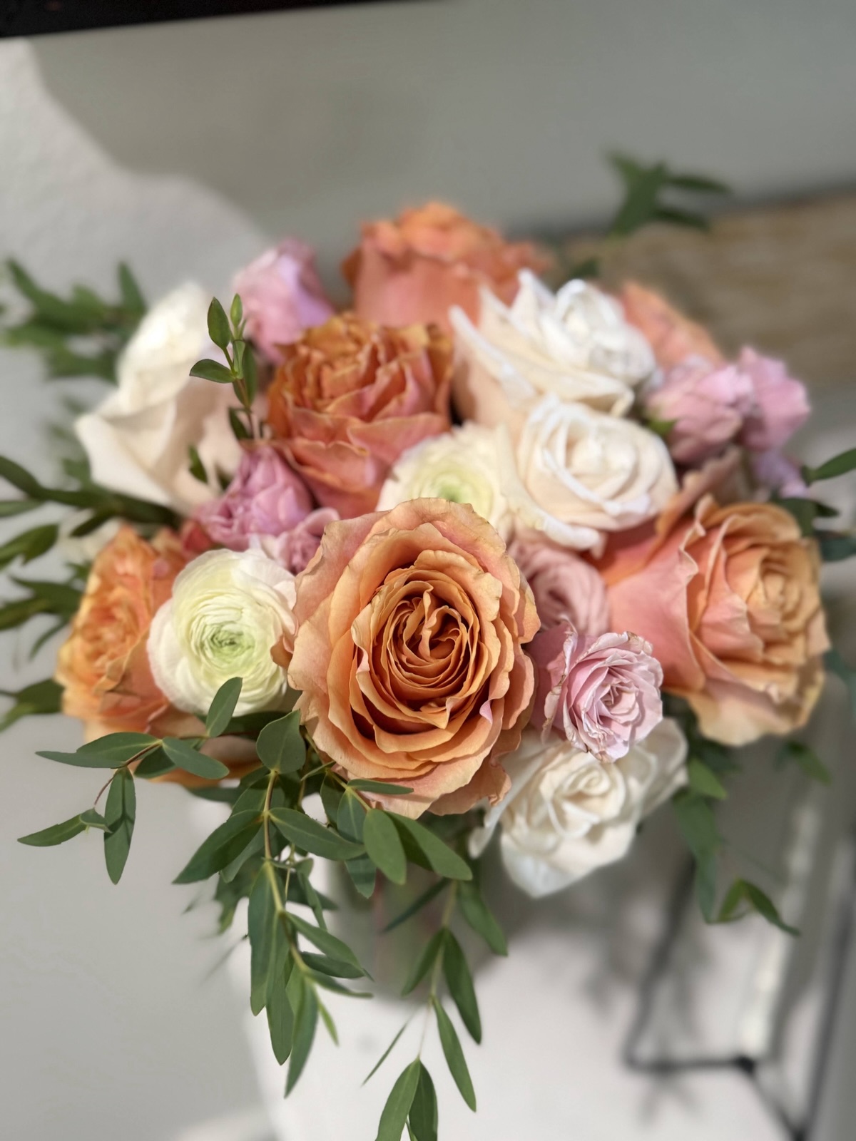 Deborah’s floral work · Peach and pink florals